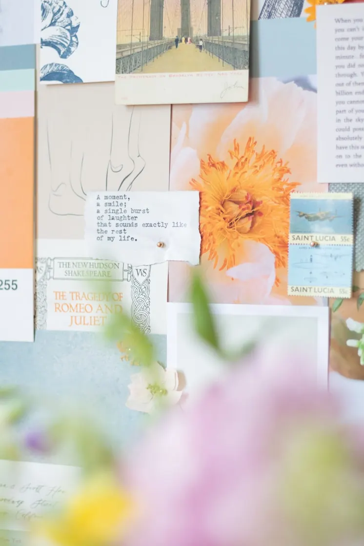 Mood board collage of paper, stamps and flowers in soft peach and blue tones